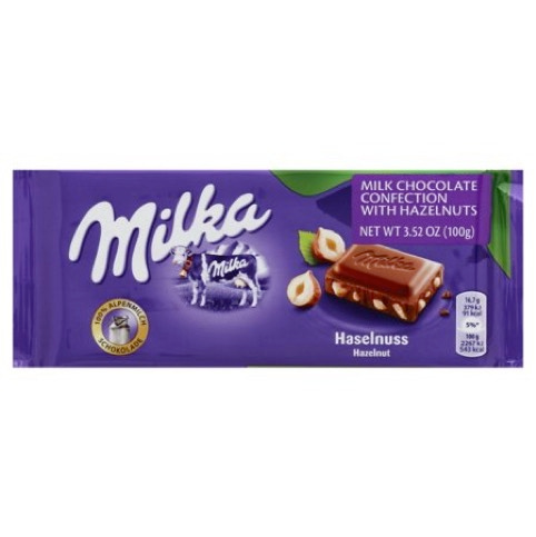 Milka Milk Chocolate Confection with Hazelnuts de 3.5 Oz